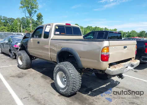 2001 Toyota Tacoma из США, поврежденный, VIN 5TEWM72N71Z780225